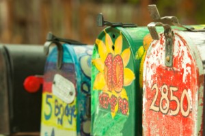 Row of Brightly Painted Rural Mailboxes